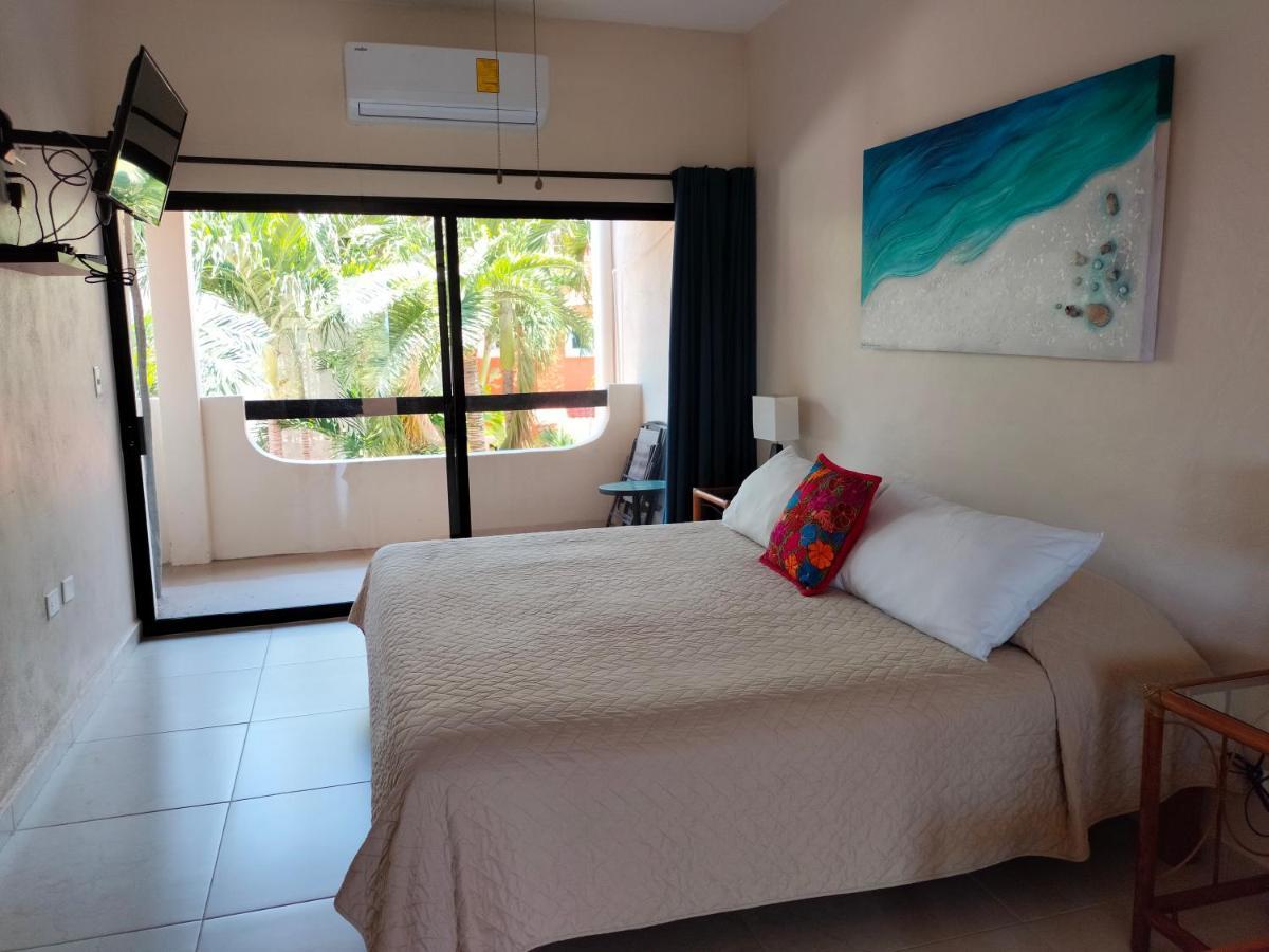 Cabanas Puerto Morelos Buitenkant foto