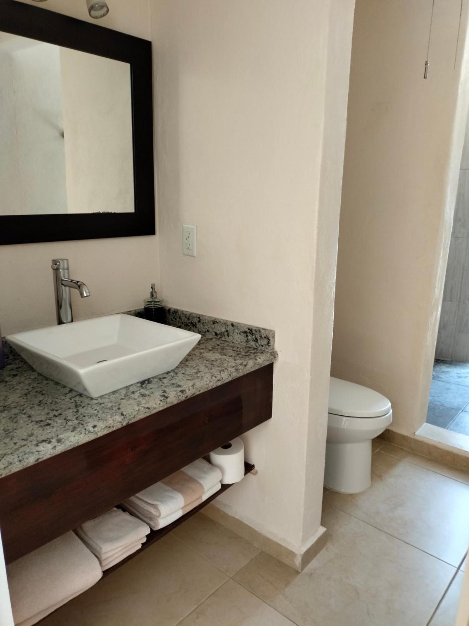 Cabanas Puerto Morelos Buitenkant foto